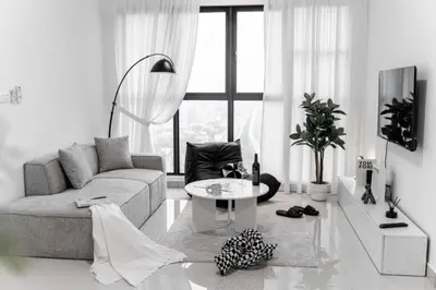 a living room with a couch and a table at Trion KL -2BR, 2-5pax, near KLCC, KL Tower, IKEA, Velocity in Kuala Lumpur