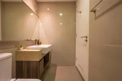 a bathroom with a sink and a toilet and a shower at One Bukit Ceylon Bukit Bintang in Kuala Lumpur