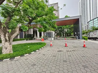 a group of orange cones on a street with a tree at M Centura Sentul Condominium Two Bedroom in Kuala Lumpur