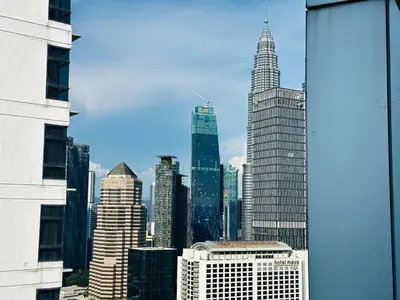 a view of a city skyline with tall buildings at Summer Suites klcc by kuala lumpur in Kuala Lumpur