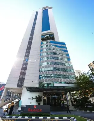a tall building with a blue and white tower at One Bukit Ceylon At Pavilion Bukit Bintang in Kuala Lumpur