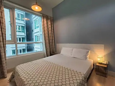 a bedroom with a bed and a large window at VR3 Sunway Velocity Spacious Apt\u4e2d\u6587\u623f\u6771 in Kuala Lumpur