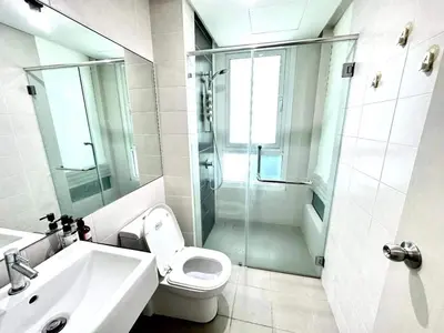 a bathroom with a shower and a toilet and a sink at VR3 Sunway Velocity Spacious Apt\u4e2d\u6587\u623f\u6771 in Kuala Lumpur