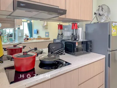 a kitchen with a stove with pots and pans on it at 3BR3B Hozem KL4523 Apartment Segambut in Kuala Lumpur