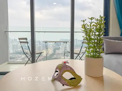 a table with a mask and a plant on it at 3BR3B Hozem KL4523 Apartment Segambut in Kuala Lumpur