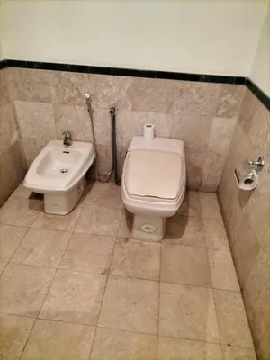 a bathroom with a toilet and a sink at Times Square Suite KL in Kuala Lumpur