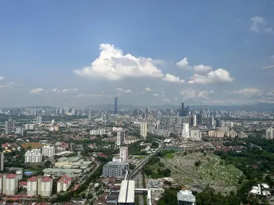 an aerial view of a city with tall buildings at Arte mont kiara by Happy stay in Kuala Lumpur