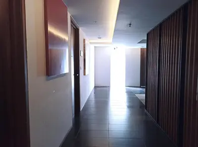 a hallway of a building with a tile floor at D'Majestic Place in Kuala Lumpur