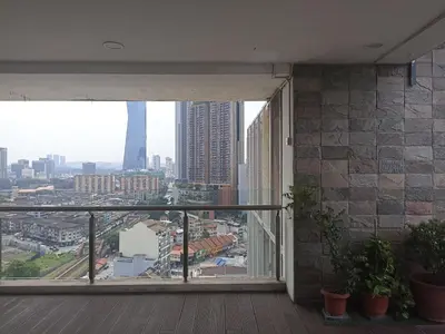 a balcony with a view of a city at D'Majestic Place in Kuala Lumpur