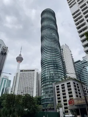 a tall building in a city with skyscrapers at Vortex Suites klcc By Sayang in Kuala Lumpur