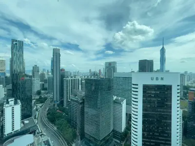 an aerial view of a large city with skyscrapers at Vortex Suites klcc By Sayang in Kuala Lumpur