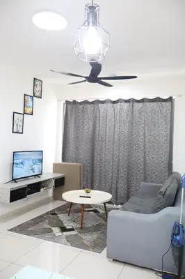 a living room with a couch and a table at Cozy kenwingston Platz KL 2-5 pax 2BR&2BR genting view parkin netflix 3802 in Kuala Lumpur
