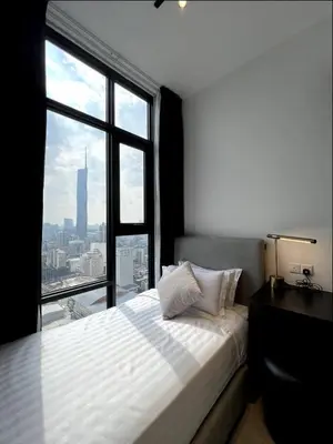 a bedroom with a bed and a large window at KL Suites Axon Residence - Wi-Fi 500Mbph in Kuala Lumpur