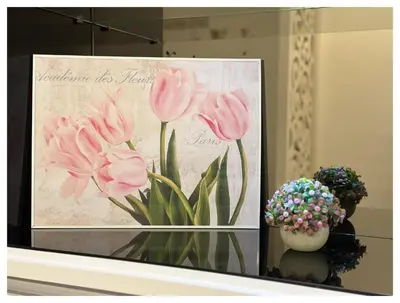 a picture of pink flowers in a display case at Setapak Central Premium Suites in Kuala Lumpur