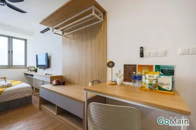 a room with a desk and a bed in a room at 24h Check in & SkyPool- KL Sentral Suite Riveria City Near KL Sentral KL KLCC in Kuala Lumpur