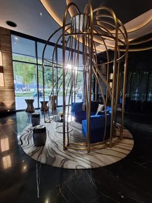 a room with a couch and a large window at STAR Residence KLCC City Centre in Kuala Lumpur