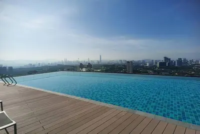 a swimming pool on the roof of a building at Ooak suites Mont Kiara 163 \uc624\ud06c\uc2a4\ud14c\uc774 in Kuala Lumpur
