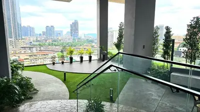 a balcony in a building with a view of a city at Cozy Axon Residence Bukit Bintang by Konoha Suites 1-3pax in Kuala Lumpur