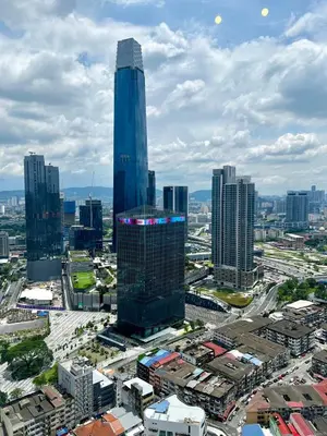 a view of a city with a tall skyscraper at Cozy Axon Residence Bukit Bintang by Konoha Suites 1-3pax in Kuala Lumpur