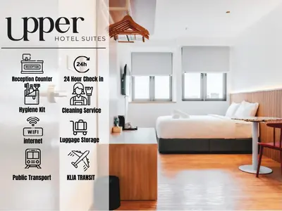 a bedroom with a bed and a wall with the words hyper hotel suites at Upper Hotel Suites KL Sentral in Kuala Lumpur