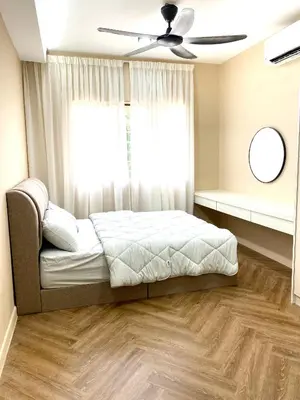a bedroom with a bed and a ceiling fan at Best Spot in City in Kuala Lumpur