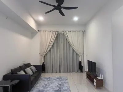 a living room with a couch and a ceiling fan at Cozy Downtown 2BR at M Suites, Embassy Row in Kuala Lumpur