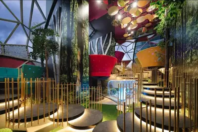 a room with a bunch of chairs and plants at Arte Plus Jalan Ampang, KLCC Level 35 in Kuala Lumpur