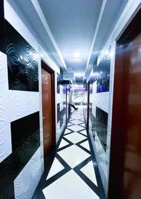 a hallway in a building with ailed floor at ARK Wave Hotel Ampang in Ampang