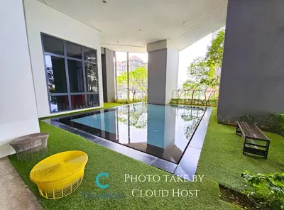 a swimming pool in the middle of a house at The Mews Kuala Lumpur Homestay with Bathtub 700m to KLCC by Cloud Host in Kuala Lumpur