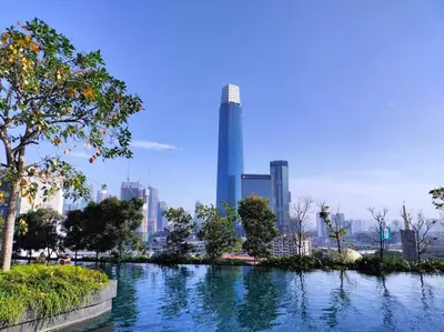 a view of a river with a city in the background at Continew TRX Corner 2-BR, 2 Balconies City Views in Kuala Lumpur
