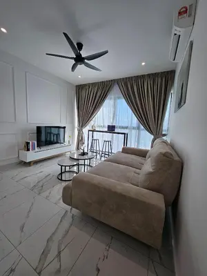 a living room with a couch and a ceiling fan at Alfa Bangsar by City Keys in Kuala Lumpur