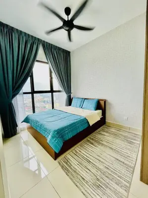 a bedroom with a bed and a ceiling fan at Trion Kuala Lumpur KLCC view L65 2br 2bth in Kuala Lumpur