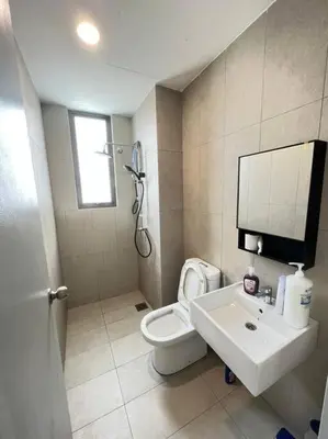 a bathroom with a white toilet and a sink at Cozy kenwingston platz kl 2-5pax 2BR&2BR Klcc view pakin netflx 3705A in Kuala Lumpur