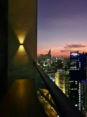 a view of a city at night from a building at SkyView Studio, EST Bangsar, High View for 2 in Kuala Lumpur