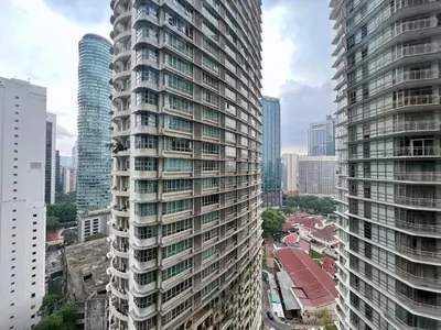 a view of a tall building in a city at Sky Suites Centrale 3BR Suite at KLCC in Kuala Lumpur