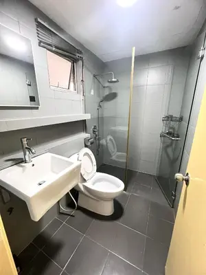 a bathroom with a toilet and a sink and a shower at Superior Seri Maya Kuala Lumpur in Kuala Lumpur