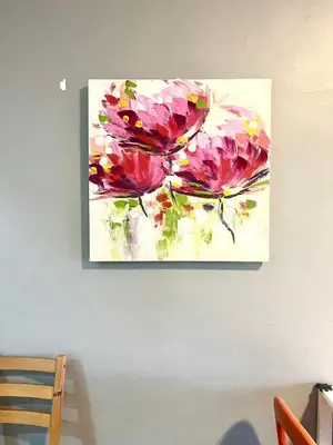 a painting of pink flowers on a wall at Superior Seri Maya Kuala Lumpur in Kuala Lumpur
