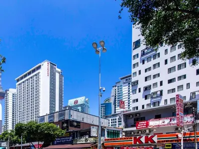 a city with tall buildings and a street light at OYO 304 Zero Hour Hotel in Kuala Lumpur