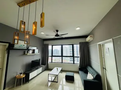 a living room with a couch and a ceiling fan at Arte Plus by Willow Trip in Ampang