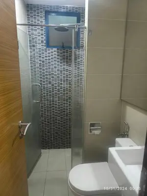 a bathroom with a shower with a toilet and a sink at 018-6 Sweet Home-Casa Residency 2R 2B in Kuala Lumpur