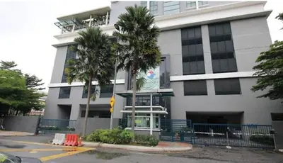 a white building with palm trees in front of it at 018-6 Sweet Home-Casa Residency 2R 2B in Kuala Lumpur