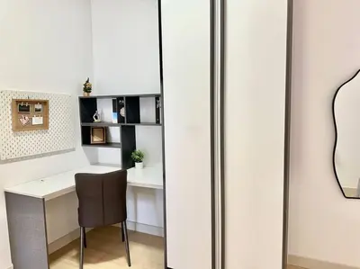 a white desk with a chair in a room at 8 Pax Continew 2R2B Premium Amenities 10mins to KLCC TRX in Kuala Lumpur
