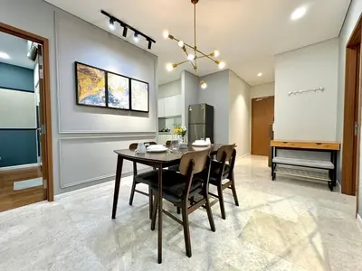 a dining room with a table and chairs at Sky Suites Deluxe 3BR Suite at KLCC in Kuala Lumpur