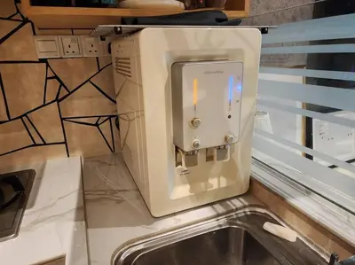 a microwave sitting on a counter next to a sink at Désir Amorous KL #Jacuzzi #NFLX #Prjscn120