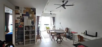 a living room with a table and a ceiling fan at City Centre Apartment in Kuala Lumpur