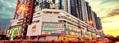 a tall building with a lot of signs on it at MH Platinum 2 Homestay 3Bedroom in Kuala Lumpur