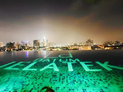 a view of a city at night with the word jump at \u5e02\u4e2d\u5fc3\u9ad8\u6863\u5957\u623f \u94fe\u63a5\u5730\u8dcc\u5546\u573a in Kuala Lumpur