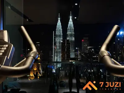 a view of the empire state building at night at Premium&Cozy Studio small cinema KLCC InfinityPool in Kuala Lumpur
