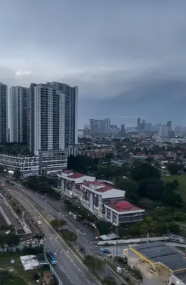 a view of a city with a highway and buildings at Azmaya homestay in Kuala Lumpur