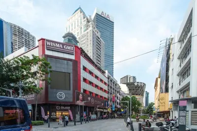 a street in a city with tall buildings at Hotel grand orchard in Kuala Lumpur